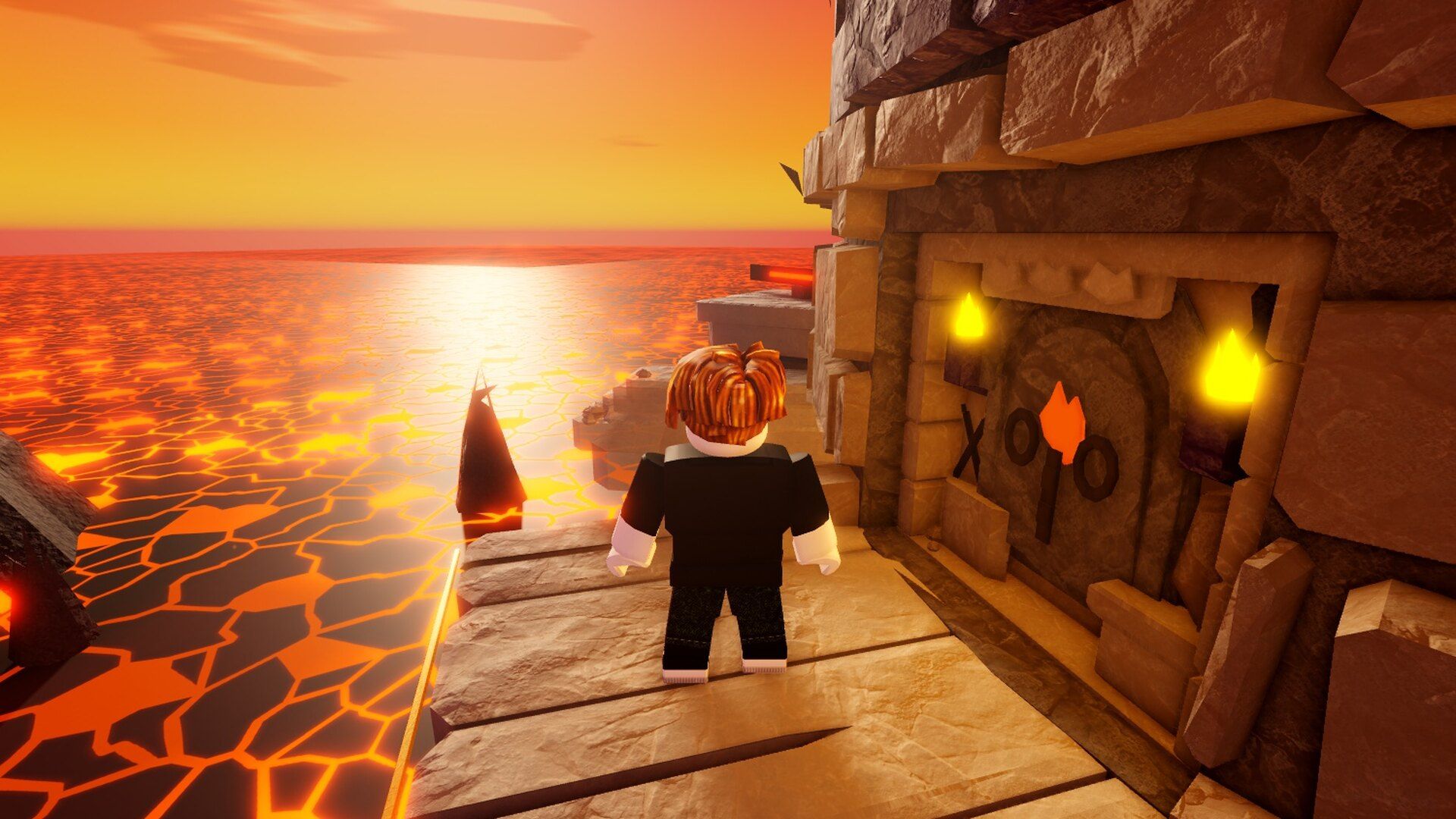 A player arrives at a torch-lit checkpoint gate, with the sun shining on the lava sea